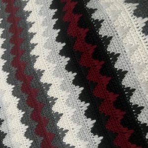 Tamborēta vilnas sega